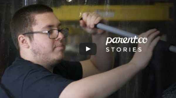 Youth washing car in Parent Co video